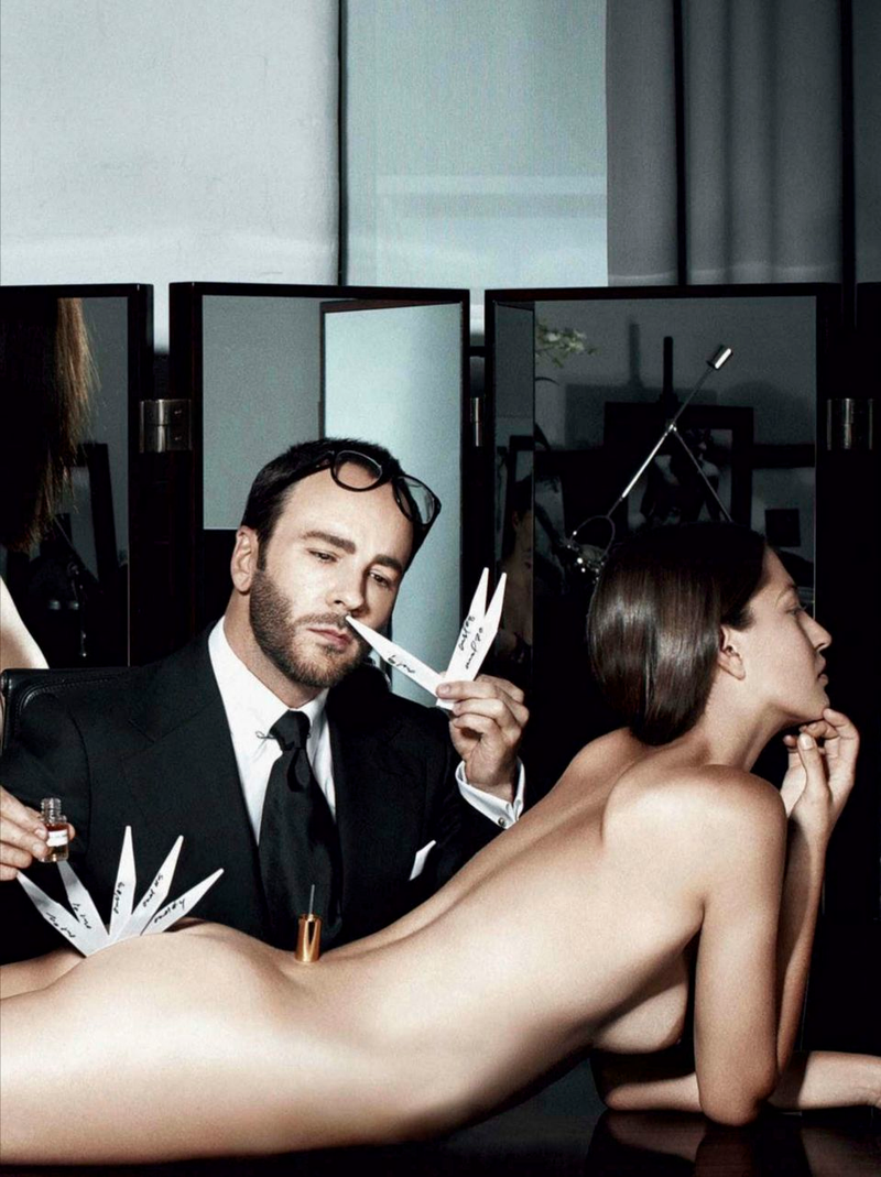 Illustration for article titled Here Is A Photo Of Tom Ford Pulling Fragrance Strips Out Of A Naked Woman's Ass